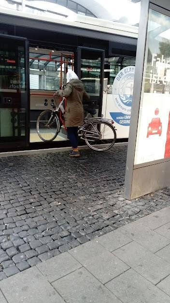 A picture containing text, ground, outdoor, sidewalk

Description automatically generated